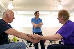 John Heginbotham leads Dance for PD class at the Mark Morris Dance Center