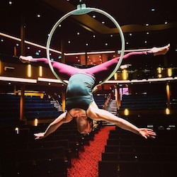 Nikki Croker performing an ariel skill on board the Quantum of the Seas: Royal Caribbean. Photo courtesy of Nikki Croker.