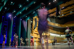 Dancers on stage at an EDT event. Photo by Herber Pelayo.