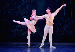 Shiori Kase as Clara and Cesar Corrales as Nephew in The English National Ballet's 'The Nutcracker'. Photo by Laurent Liotardo.