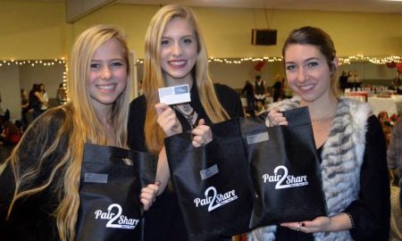 Juliana (left) Meriah (middle) Mekayla (right) at Pair2Share holiday event where Footnotes Dance Studio students bagged and added notes to shoes. Photo courtesy of Pair2Share.