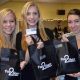 Juliana (left) Meriah (middle) Mekayla (right) at Pair2Share holiday event where Footnotes Dance Studio students bagged and added notes to shoes. Photo courtesy of Pair2Share.