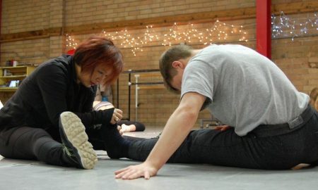 Dale Lam of Columbia City Jazz assisting a student. Photo courtesy of Lam