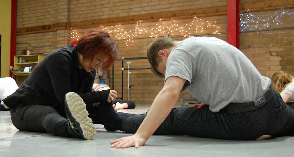 Dale Lam of Columbia City Jazz assisting a student. Photo courtesy of Lam