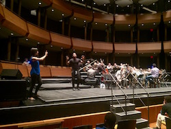 Claudia Schreier giving notes to Lil Buck onstage with Jazz at Lincoln Center Orchestra. Photo courtesy of Schreier.