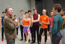 Jean-Pierre Bonnefoux speaks with dancers. Photo by Jeff Cravotta.