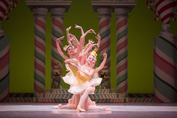 Pacific Northwest Ballet corps de ballet dancer Amanda Clark (front) with company dancers in a scene from George Balanchine's 'The Nutcracker'. Photo by Angela Sterling.