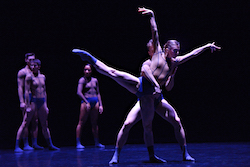 Dancers Alexis Fletcher and Peter Smida with artists of Ballet BC in Aura. Photo by Michael Slobodian.