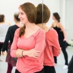 Emily Schoen watching rehearsal. Photo by Whitney Browne.