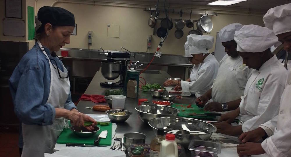 Patricia Williams in the kitchen. Photo courtesy of 10 Chairs NYC.