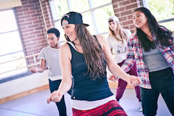 Leslie Scott with student dancers. Photo courtesy of YPAD.