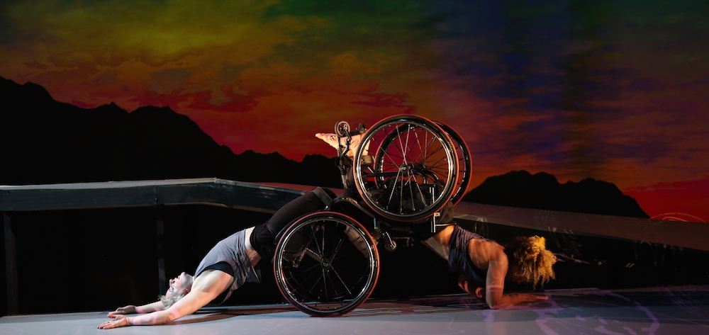 Kinetic Light dancers in a partnering backbend. Photo by Chris Cameron.