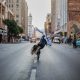 woman breakdancing on street