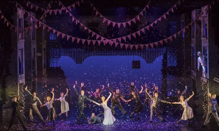 Andrew Monaghan as Harry and Ashley Shaw as Cinderella and The Company in Matthew Bourne's 'Cinderella'. Photo by Johan Persson.