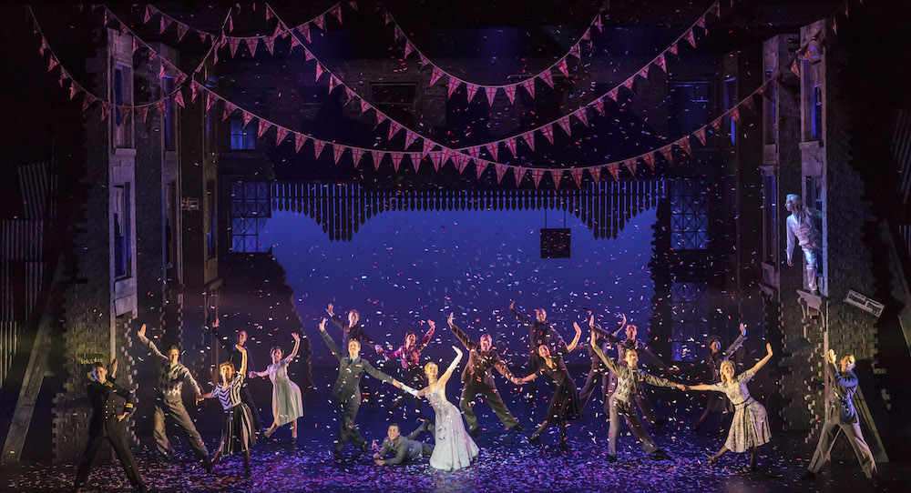 Andrew Monaghan as Harry and Ashley Shaw as Cinderella and The Company in Matthew Bourne's 'Cinderella'. Photo by Johan Persson.