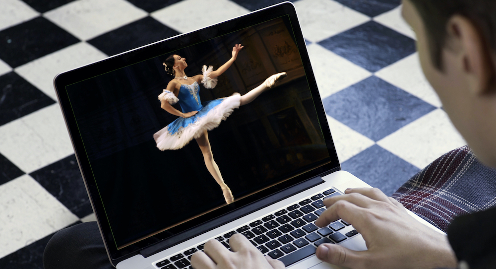 Ballerina on computer.