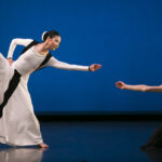Xin Ying and Anne Souder in Martha Graham's 'Prelude to Action'. Photo by Melissa Sherwood.