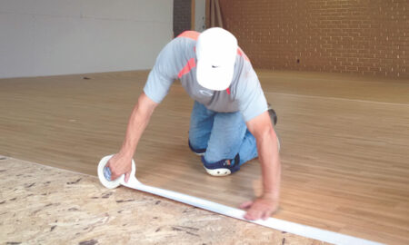 Dance floor installation by CMG Flooring.