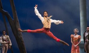 Pacific Northwest Ballet principal dancer Jonathan Batista with company dancers in Kent Stowell’s 'Swan Lake'. Photo by Angela Sterling.