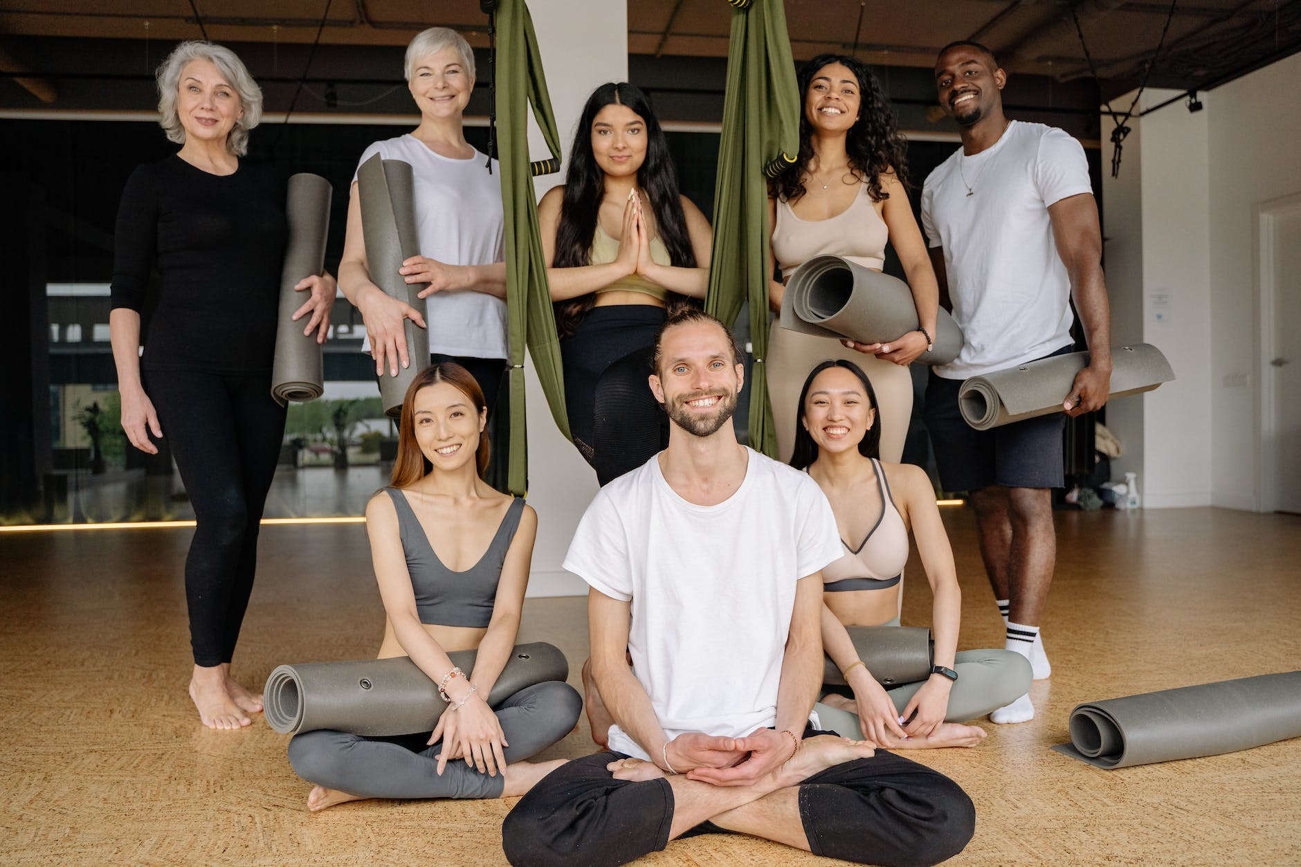 group of people at a yoga studio