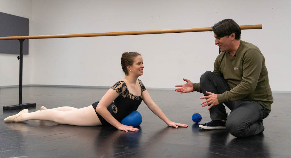 Zac Jones working with a dancer. Photo courtesy of Jones.