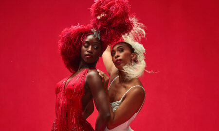 Alvin Ailey American Dance Theater's Caroline T. Dartey and Constance Stamatiou in Alvin Ailey's The Mooche. Photo by Dario Calmese.