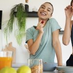 Two women preparing a healthy snack. Image by Freepik.