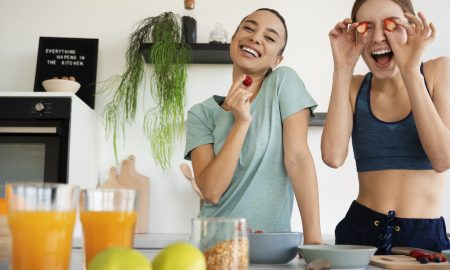 Two women preparing a healthy snack. Image by Freepik.