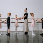 ballet dancers standing in the room