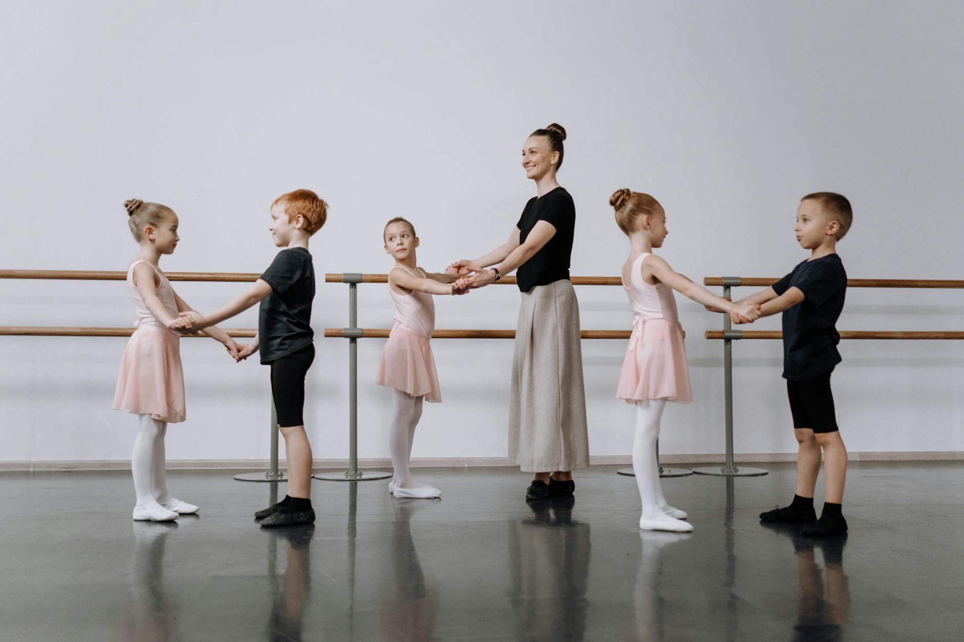 ballet dancers standing in the room