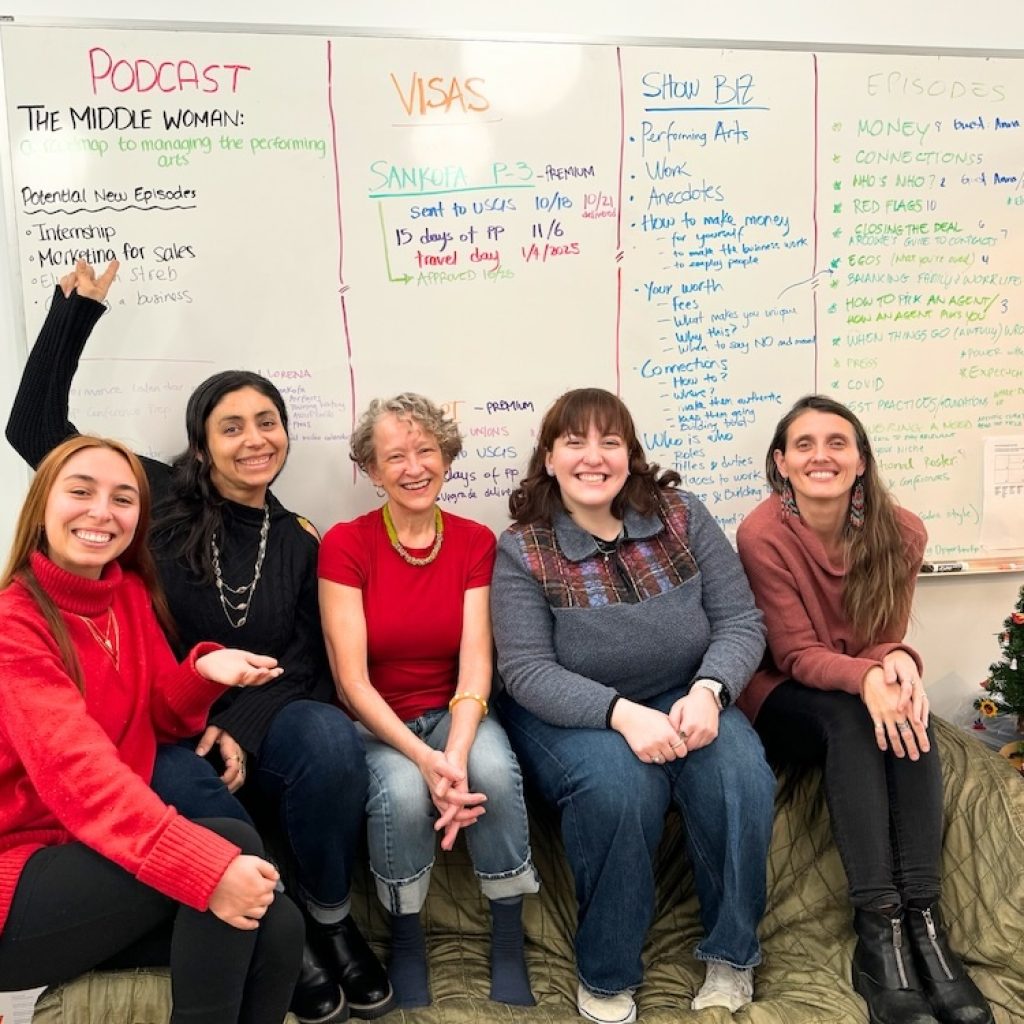 The Elsie Management Team in front of the Podcast Brainstorm Board, December 2024. Photo courtesy of Elsie Management.