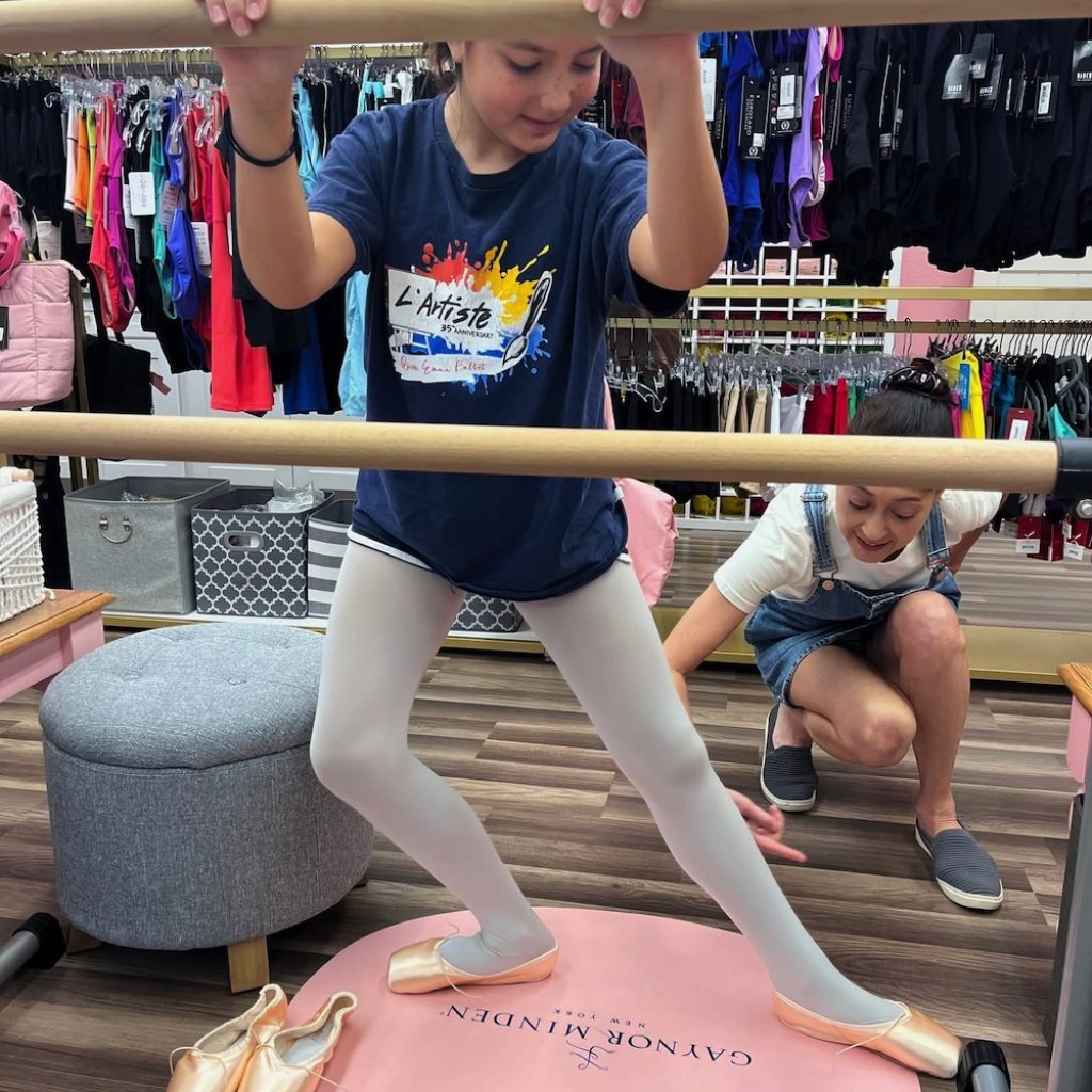A Queen Emma Ballet student with Therese Miyoshi Wendler.
